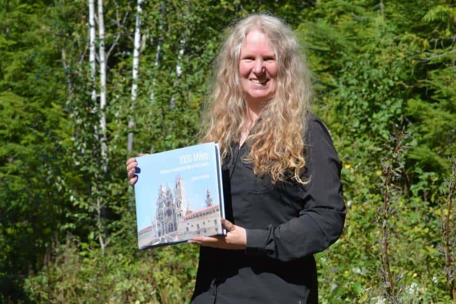 Sharon with her newly released hard back book ‘1000 Miles: Walking & Painting the Way of Saint James’. 