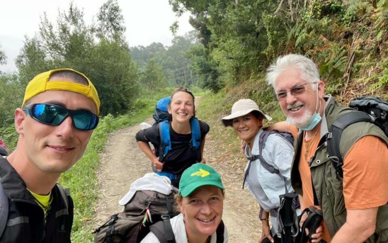 a picture of a group of pilgrims on their way to the forest